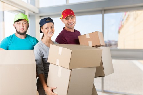 Packed office boxes and equipment ready for transport from a Battersea office