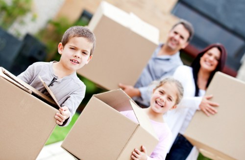 Mover handling household items carefully during a Battersea house removal