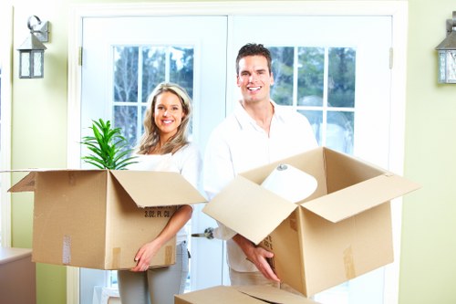 Packed boxes and student furniture ready for collection in Battersea