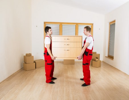 Boxes and furniture being loaded for a flat move in Battersea